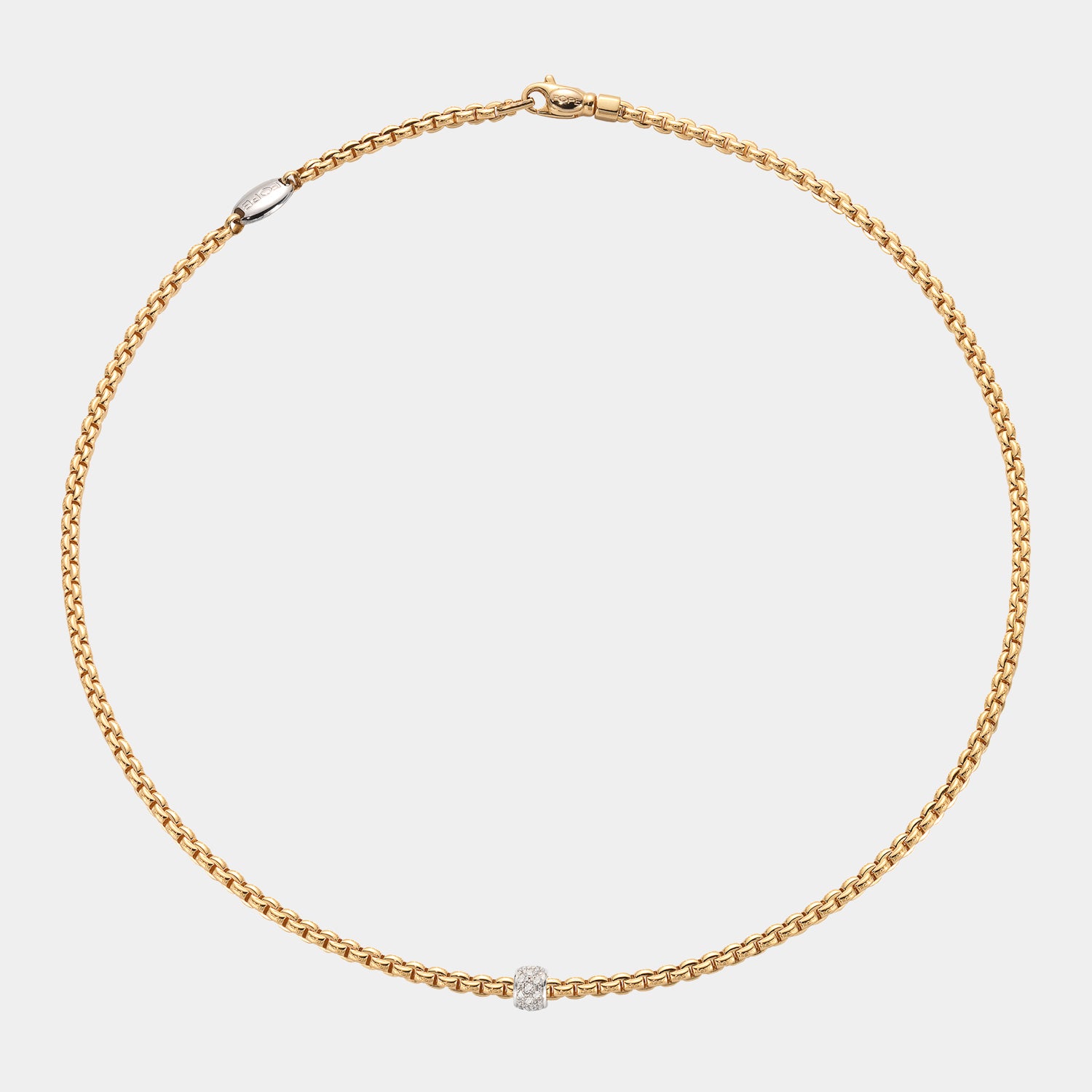 Yellow gold necklace with white gold diamond station