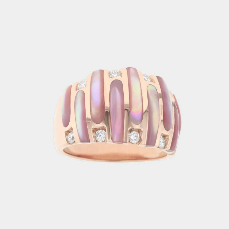 Rose gold pink mother of pearl diamond ring on grey background