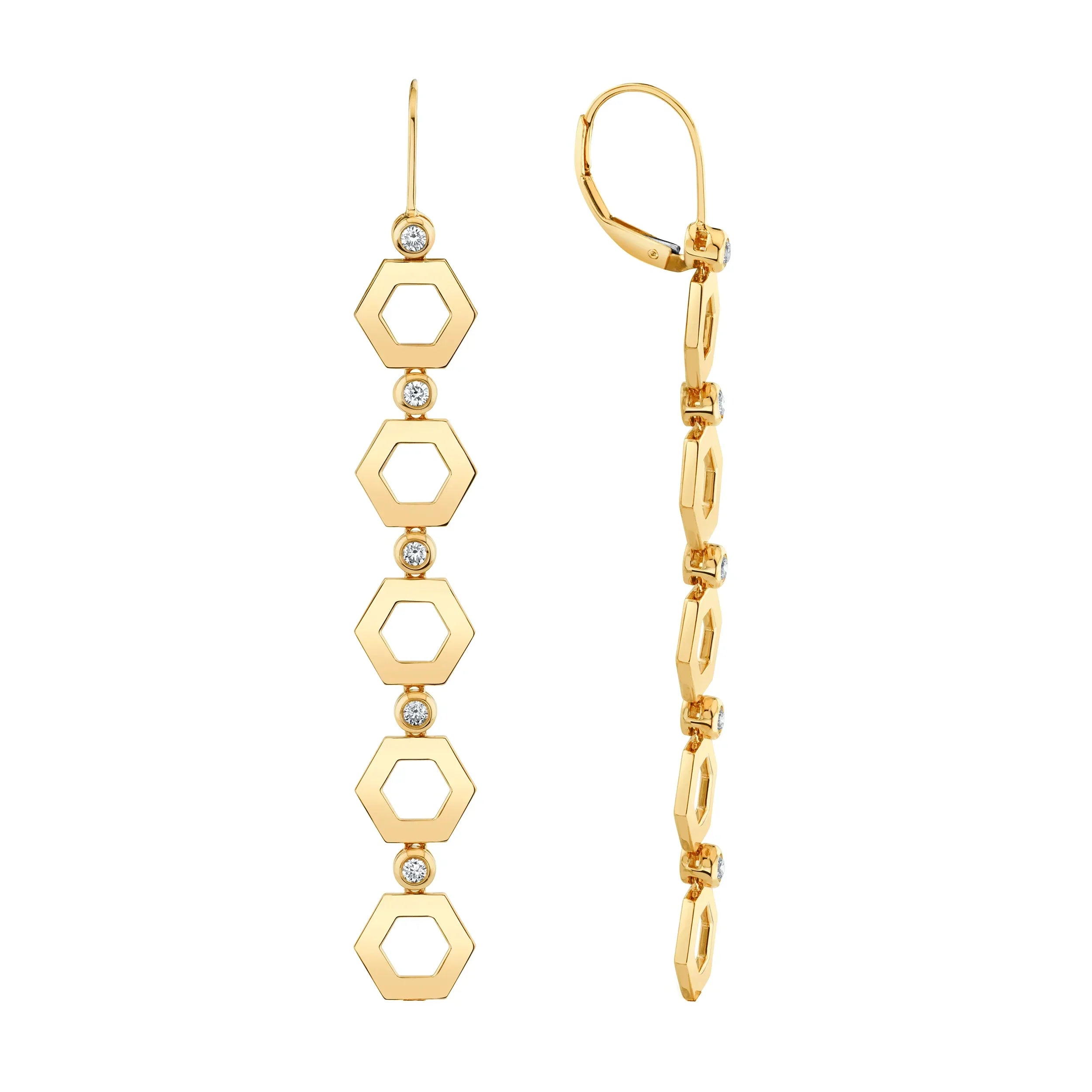 Yellow gold hex infinity drop earrings on grey background, front and side view