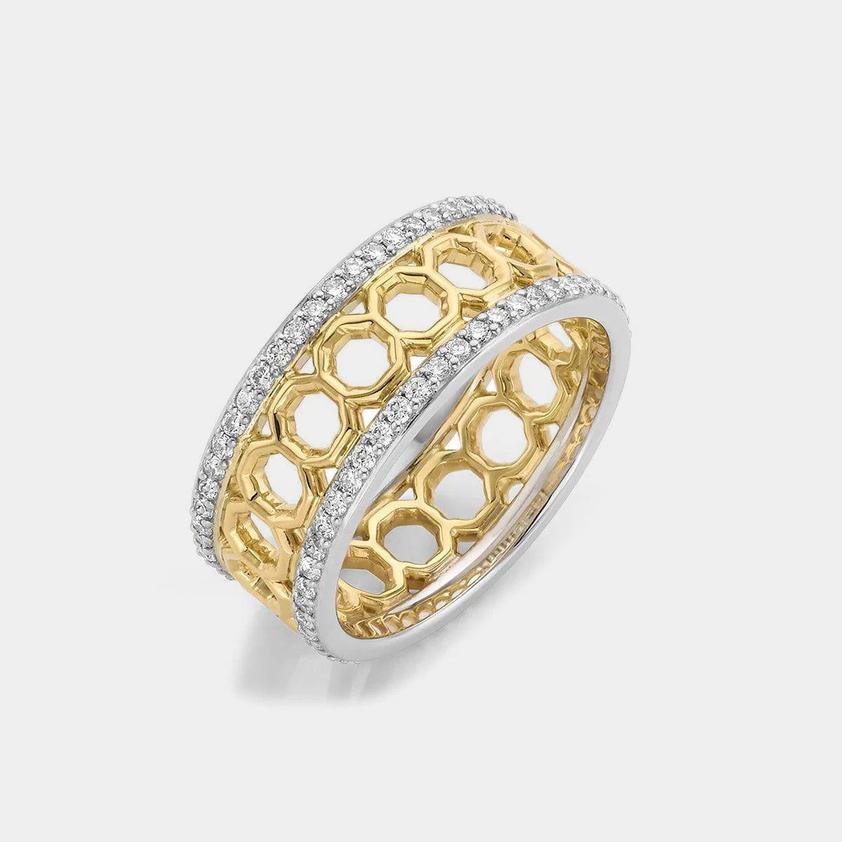 White and yellow gold octagon pattern diamond fashion ring on grey background, side angle view