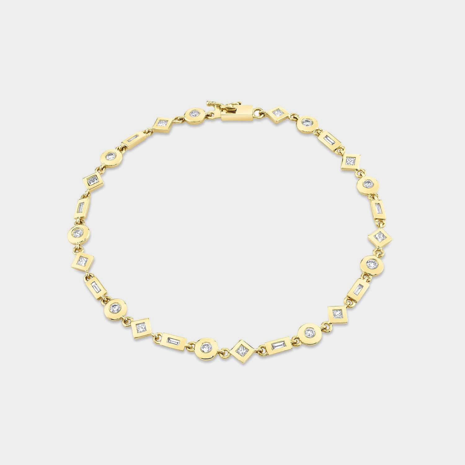 Yellow gold mixed shape bezel set diamond tennis bracelet on grey background, flat lay view