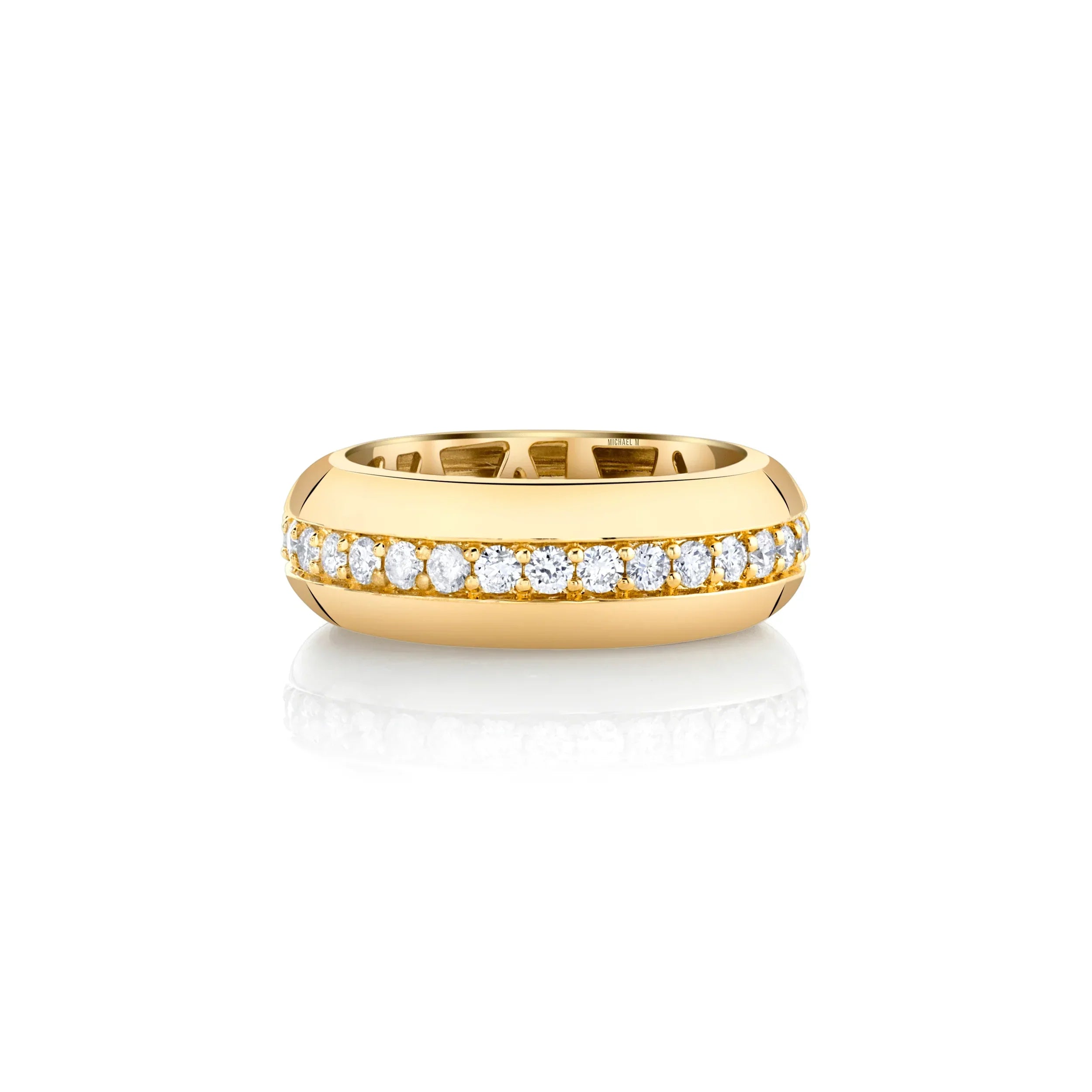 Yellow gold fashion ring with diamond center row on grey background, front view