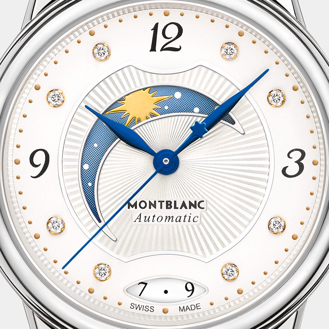 Montblanc watch face with sun and moon design on a white background