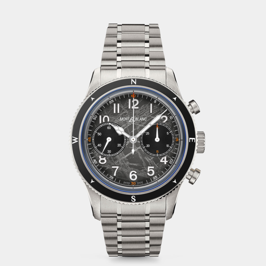 Silver watch with black dial on a light gray background