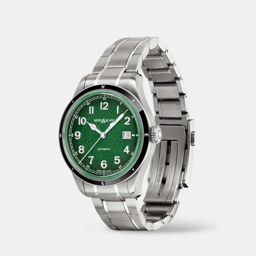 Silver watch with a green face on a white background