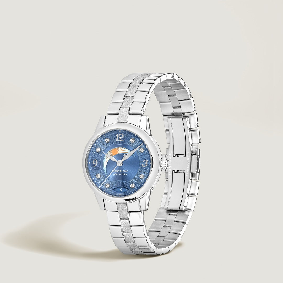Silver watch with a blue face on a light gray background