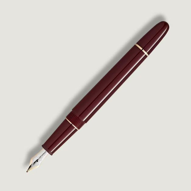 red and gold fountain pen