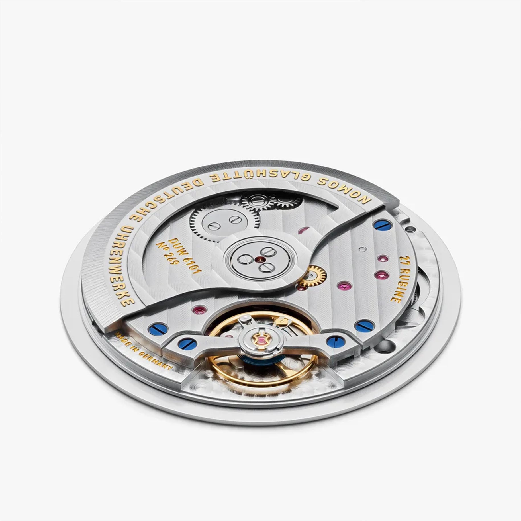 Close-up of a watch mechanism with visible brand name on a white background