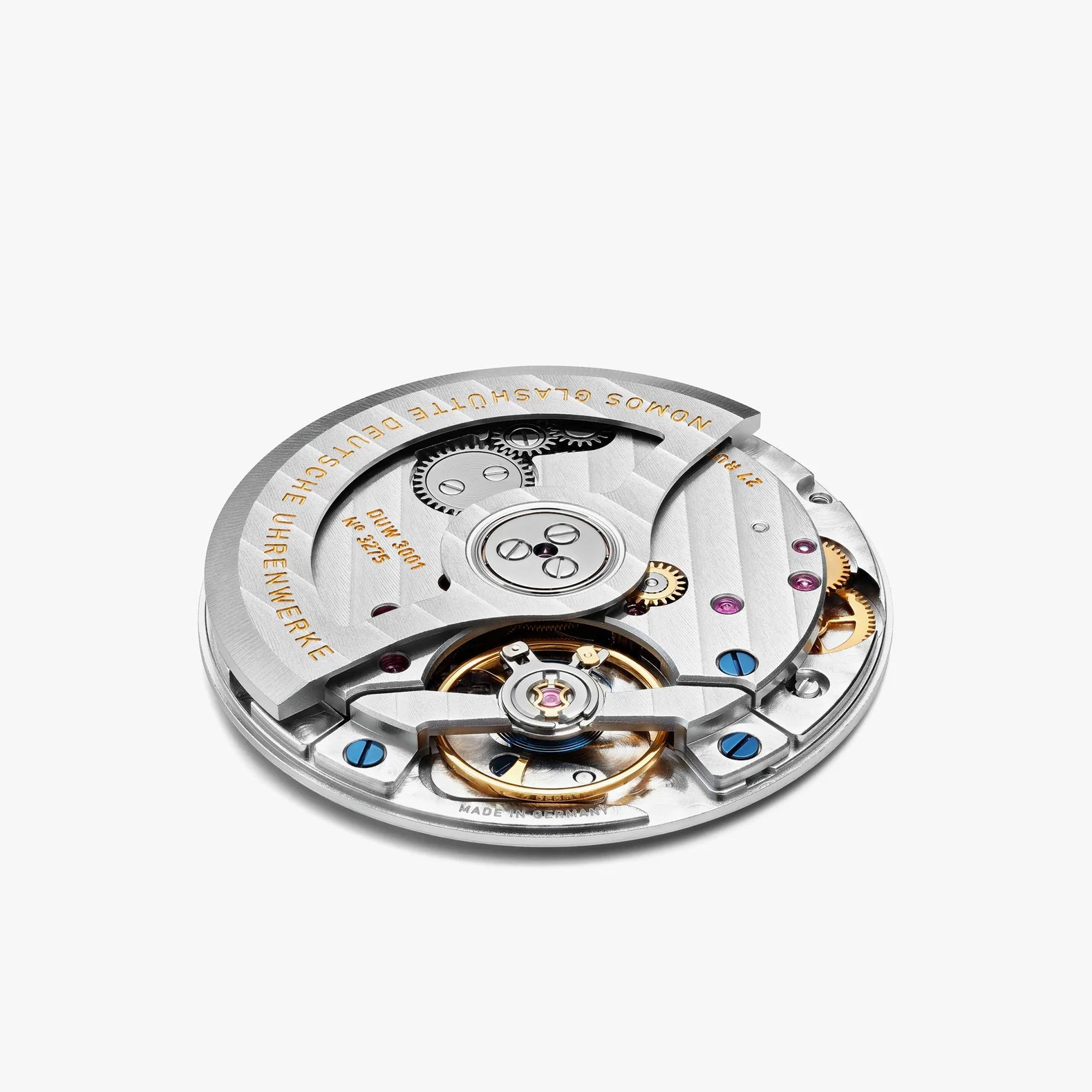 Close-up of a watch mechanism on a white background