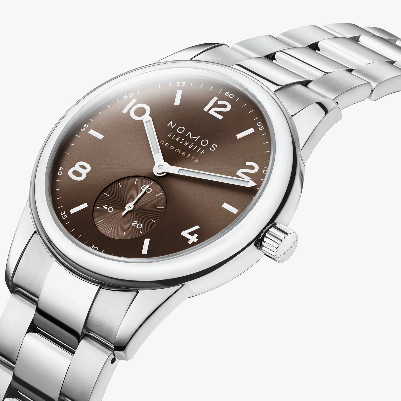 NOMOS Glashütte Club Sport Neomatik 39mm watch with tabac brown sunburst dial, luminous hands, and stainless steel bracelet on white background, side angle view