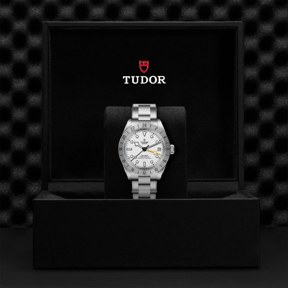 TUDOR black bay pro 39mm opaline dial watch on 3-link bracelet, presented inside the official Tudor presentation box.