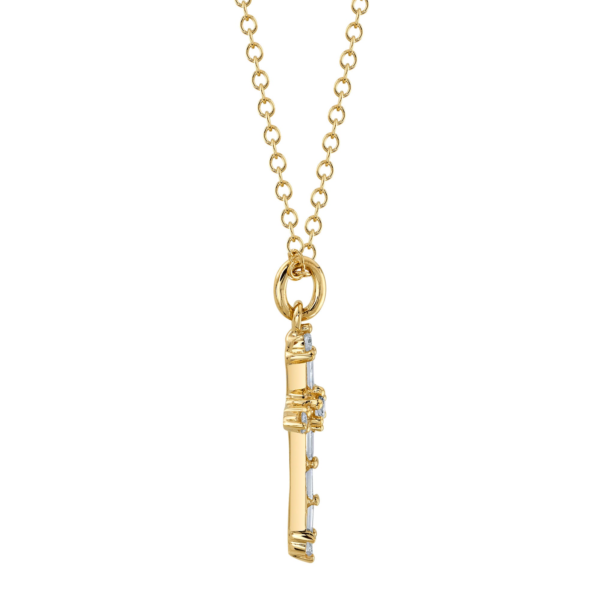 Yellow gold baguette diamond cross pendant necklace, side view