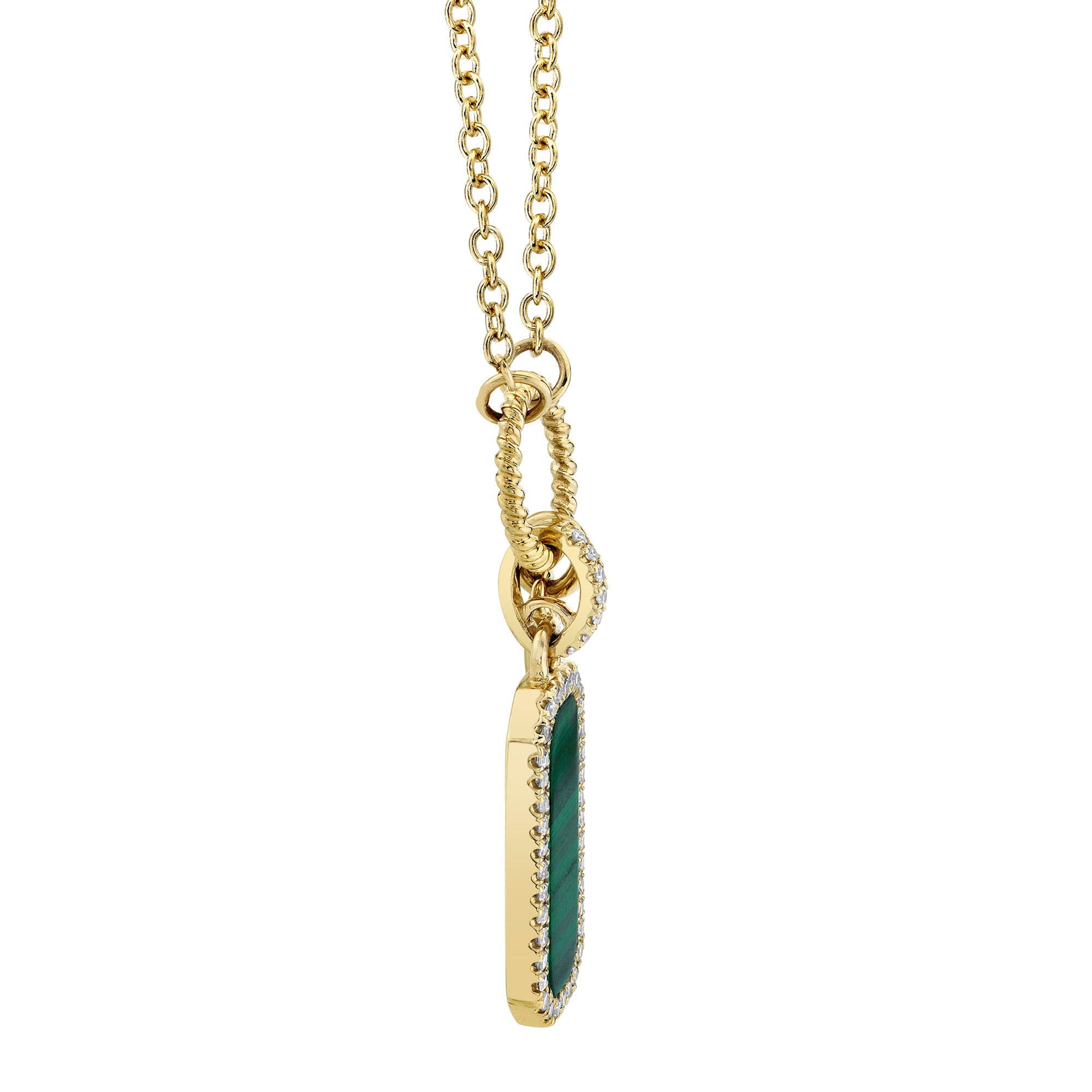 Yellow gold dog tag necklace featuring green malachite inlay, side view