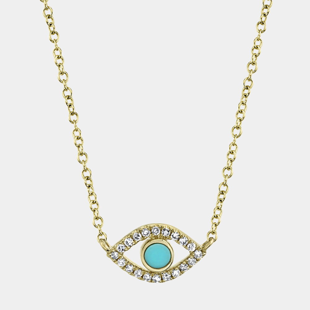 Gold necklace with a turquoise eye pendant on a white background
