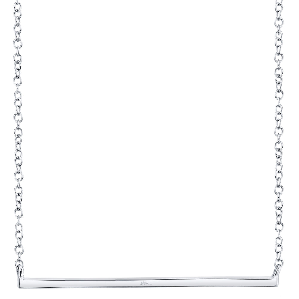 Silver necklace with a horizontal bar pendant on a white background