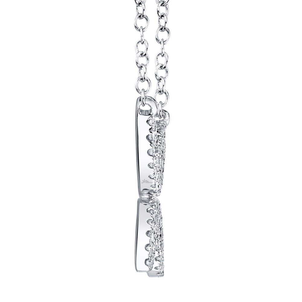 White gold diamond flower pendant necklace, side view