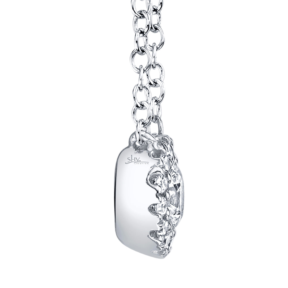 White gold diamond necklace on a light gray background, side view