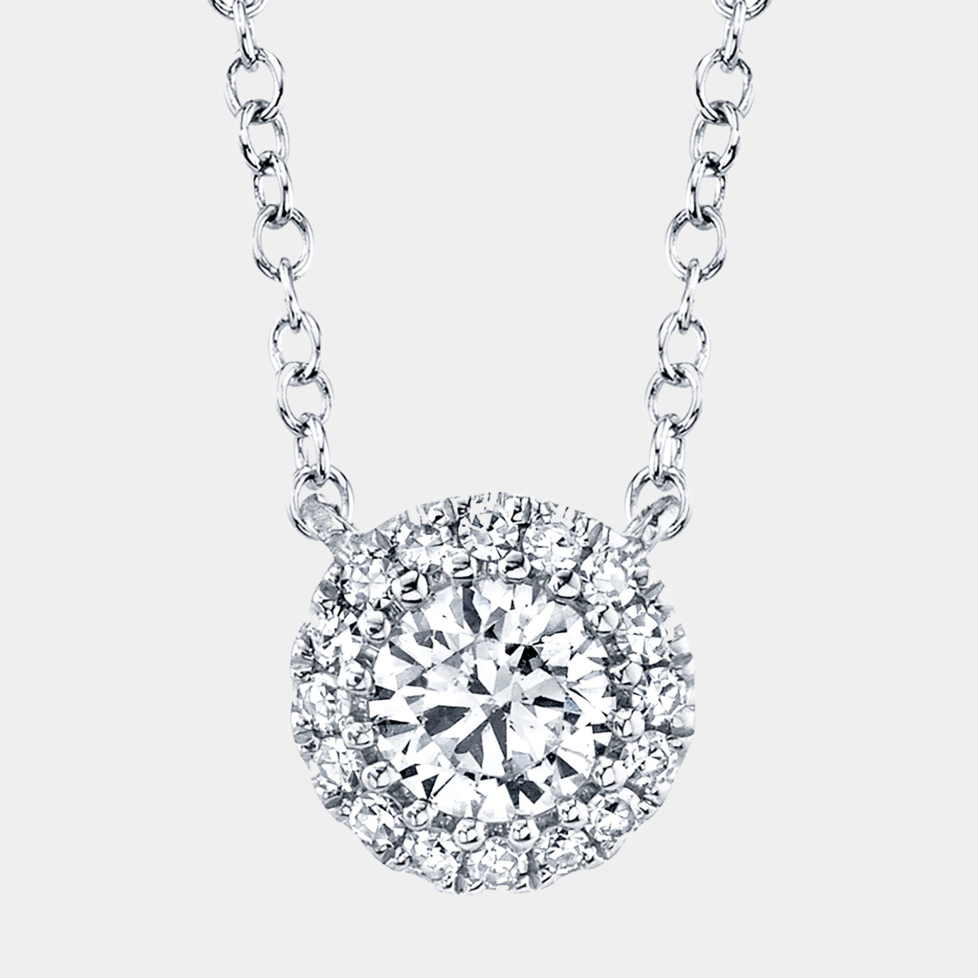 White gold diamond halo pendant, front view
