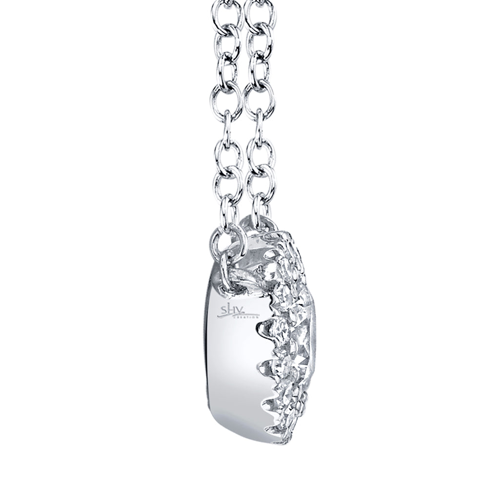 White gold diamond halo pendant, side view