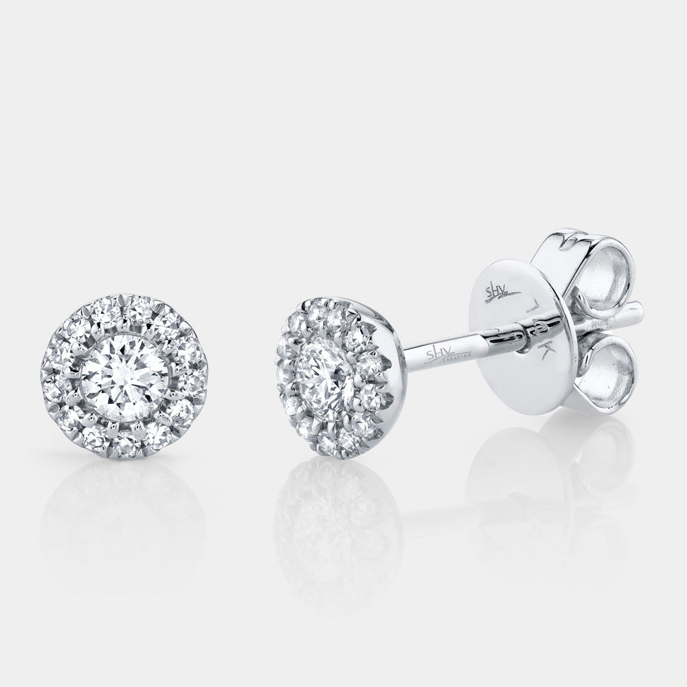 White gold diamond halo stud earrings, front angle view
