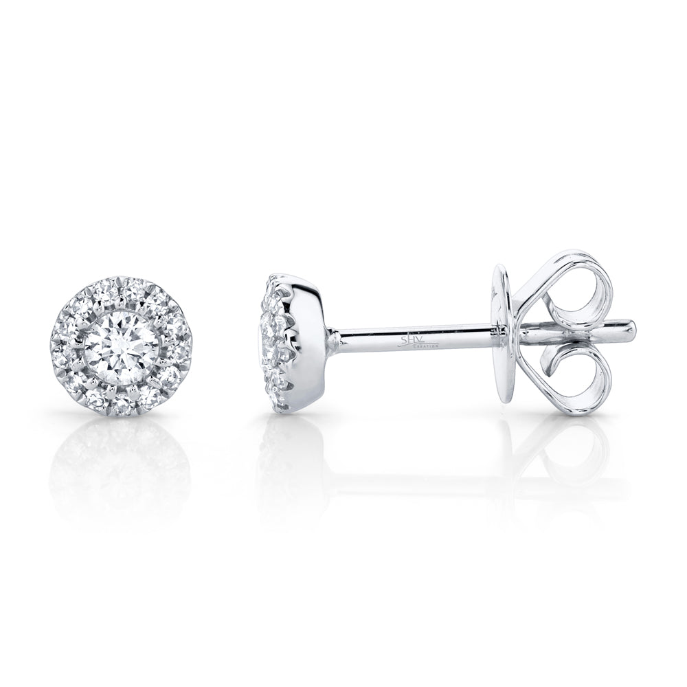 White gold diamond halo stud earrings, side angle view