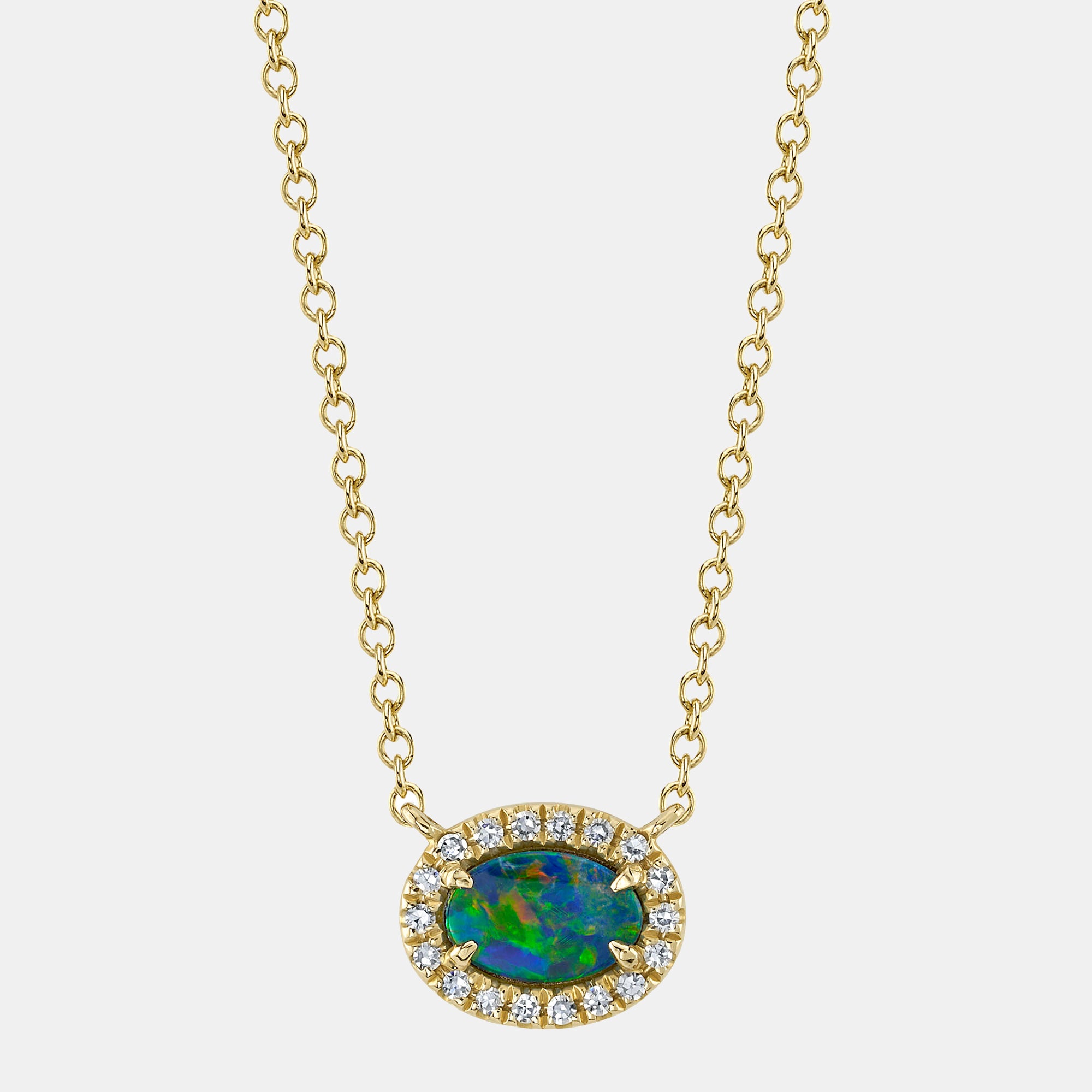 Gold necklace with an opal pendant