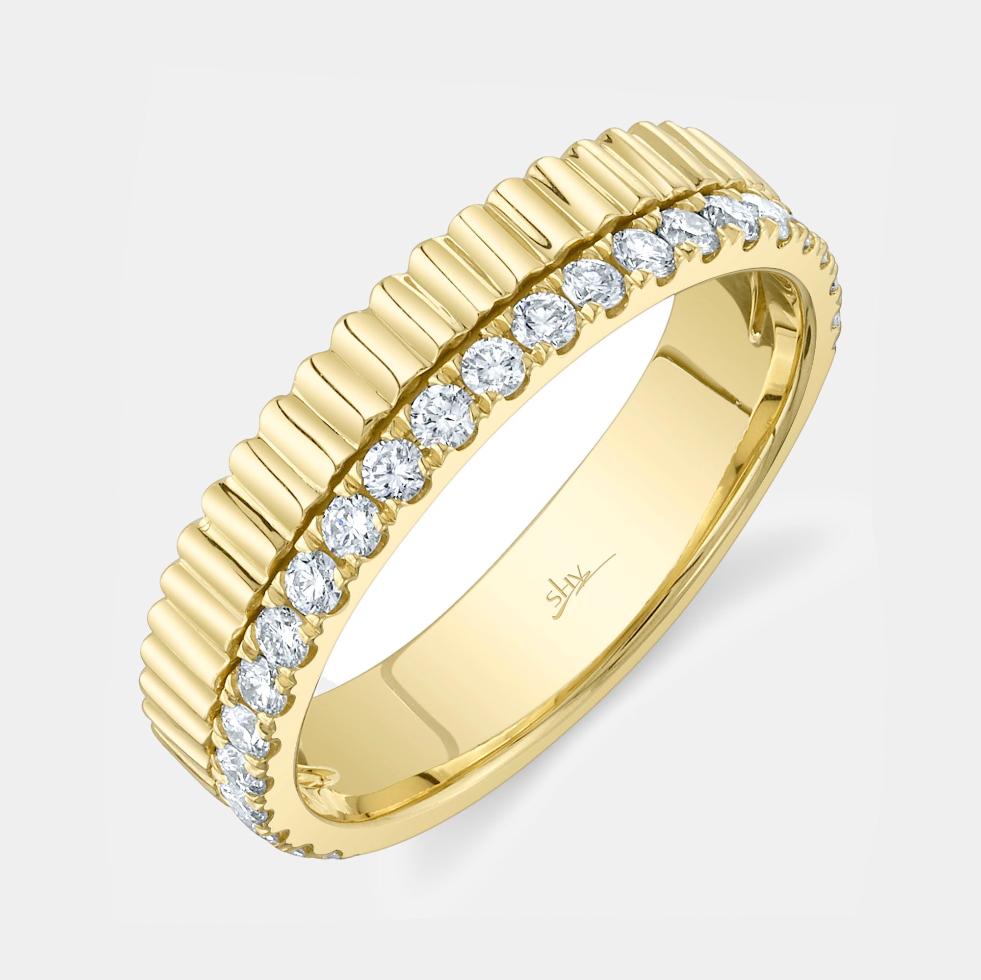 Yellow gold ribbed diamond fashion ring, top angle view