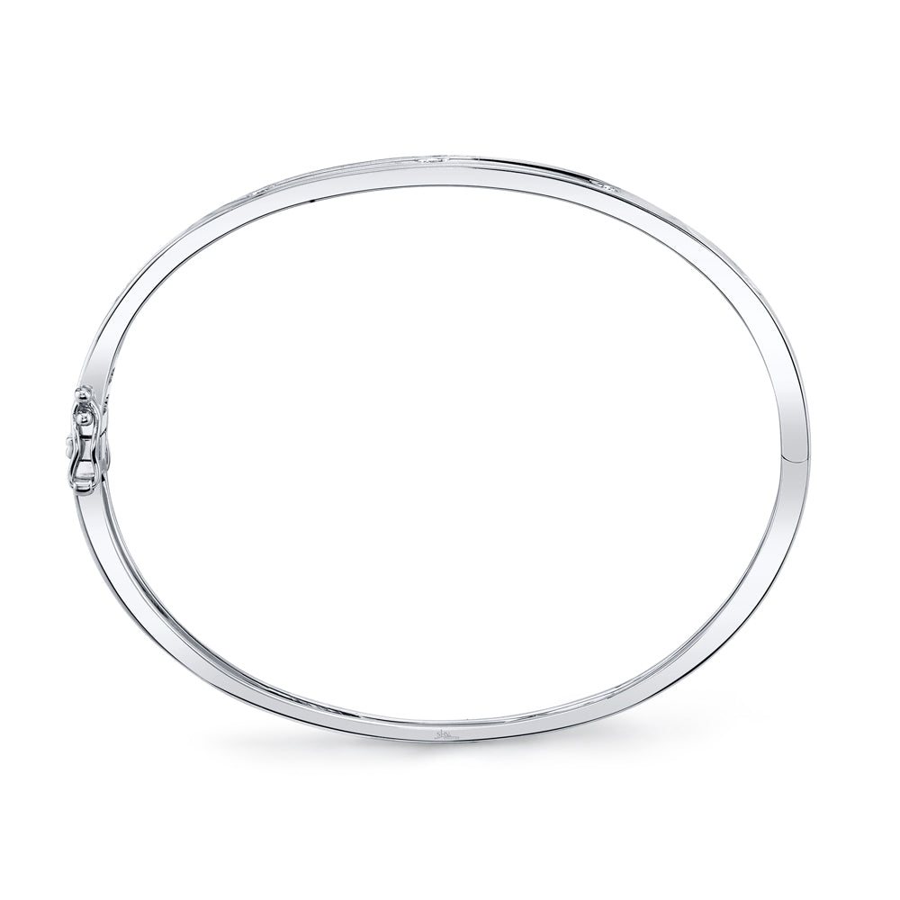 White gold bezel set diamond bangle bracelet, side upright view