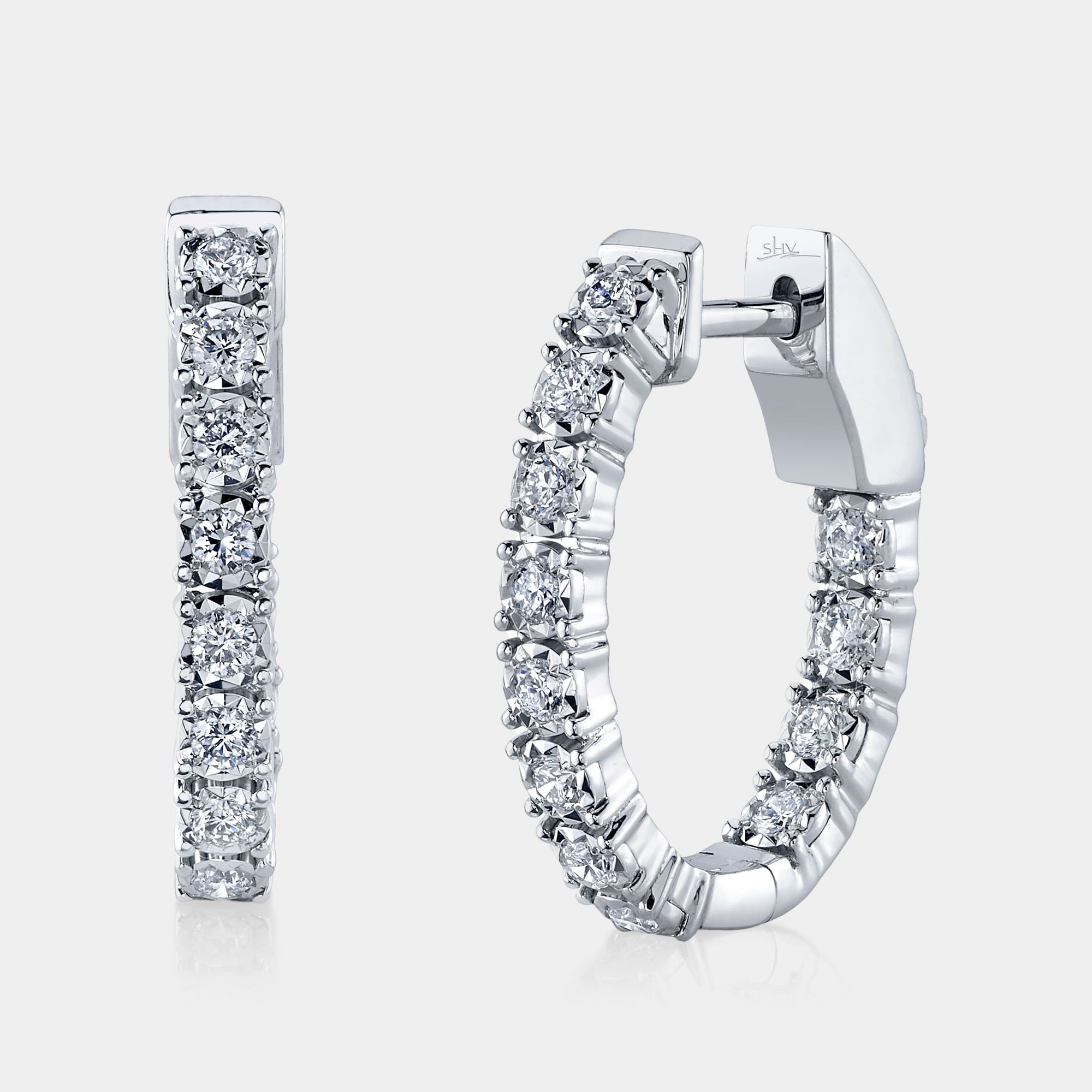 White gold diamond hoop earrings, front angle view