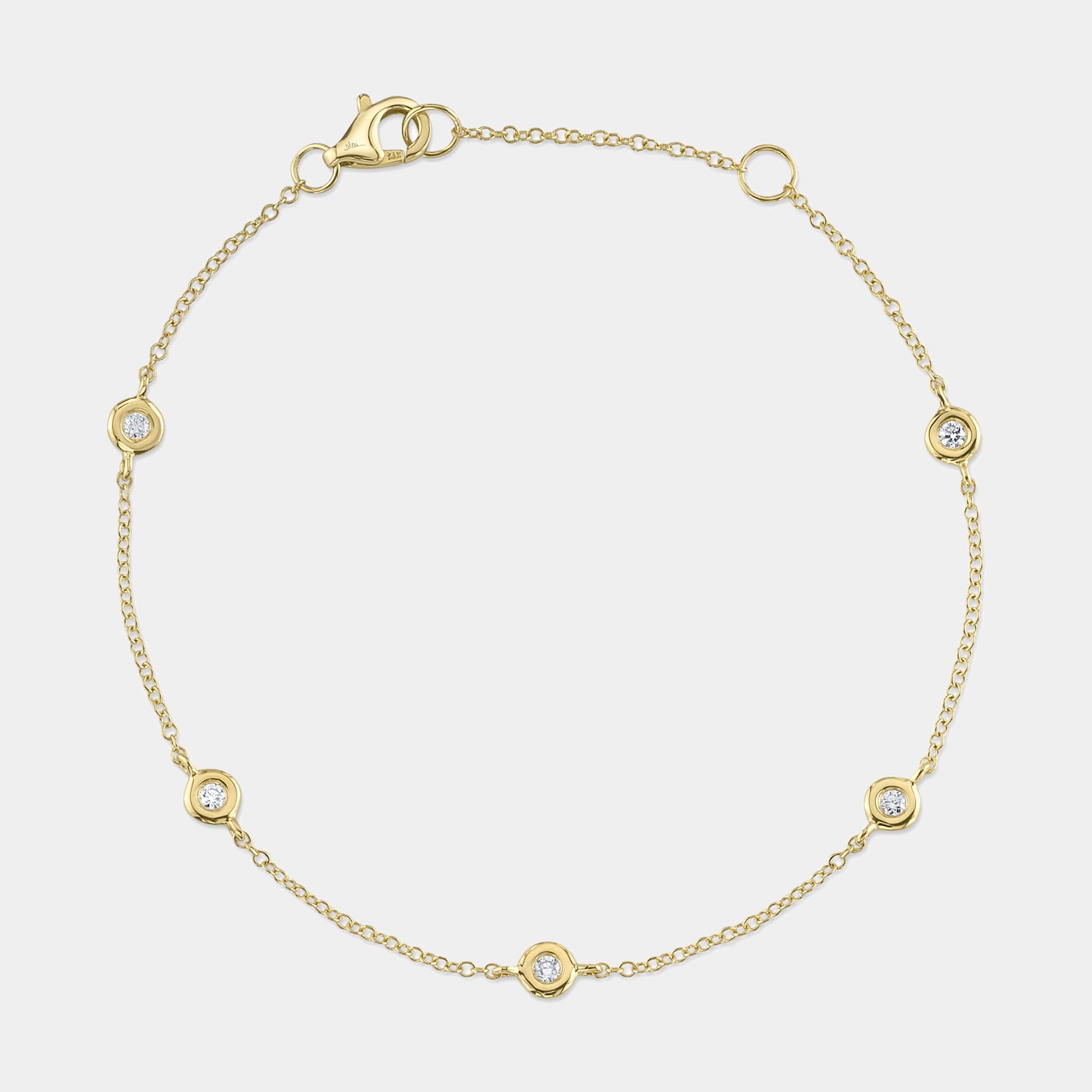 Yellow gold diamond station bracelet, front view