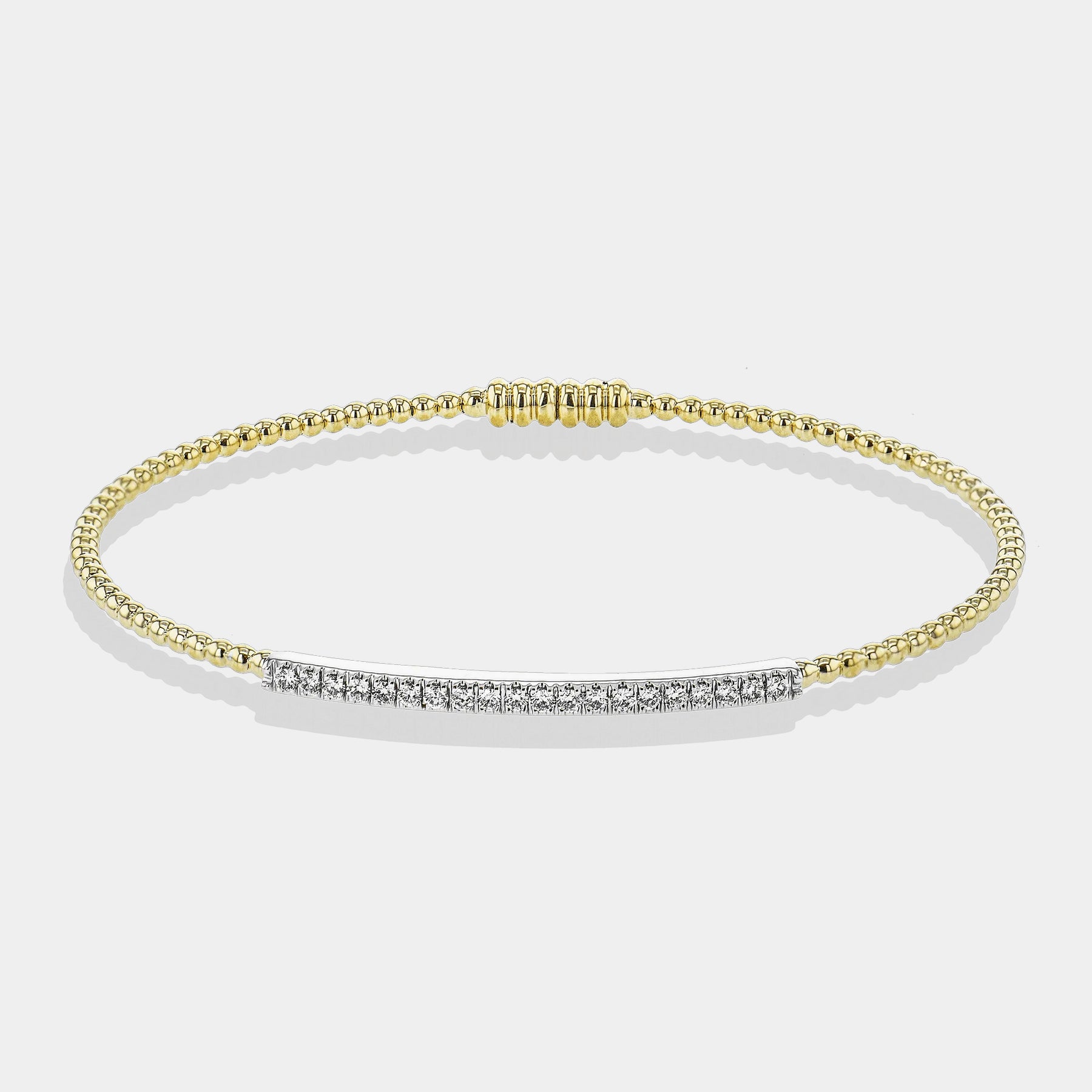 Yellow gold diamond bangle bracelet