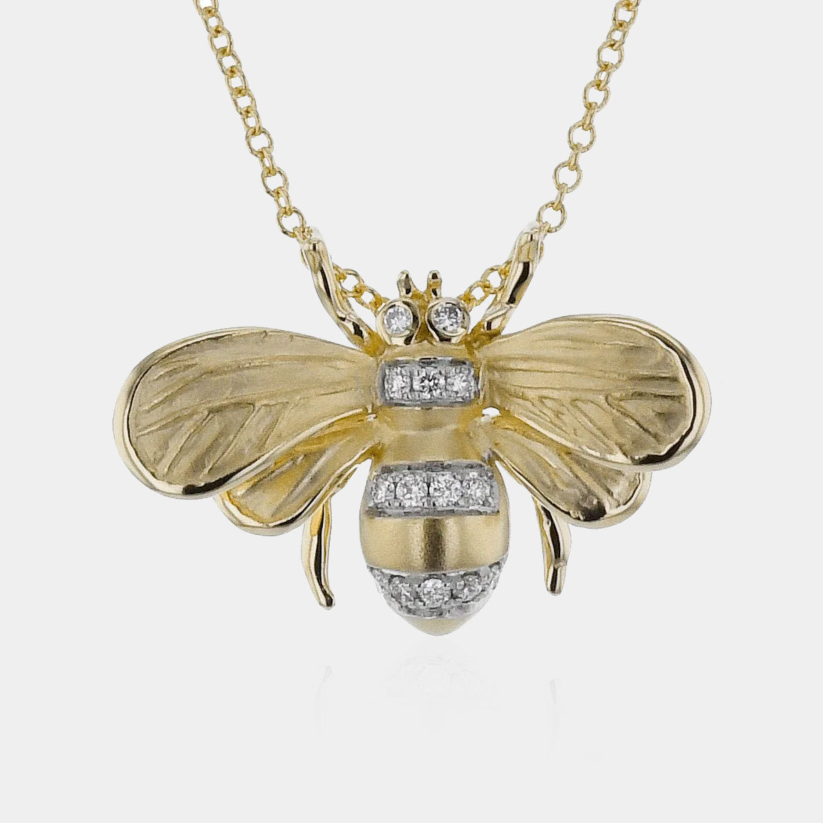 Yellow gold diamond bee pendant necklace
