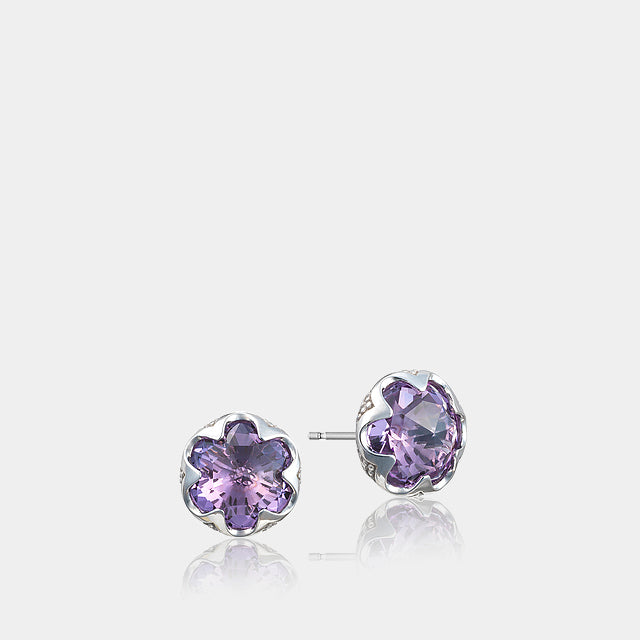 Sterling Silver and Gold Amethyst Stud Earrings on grey background.