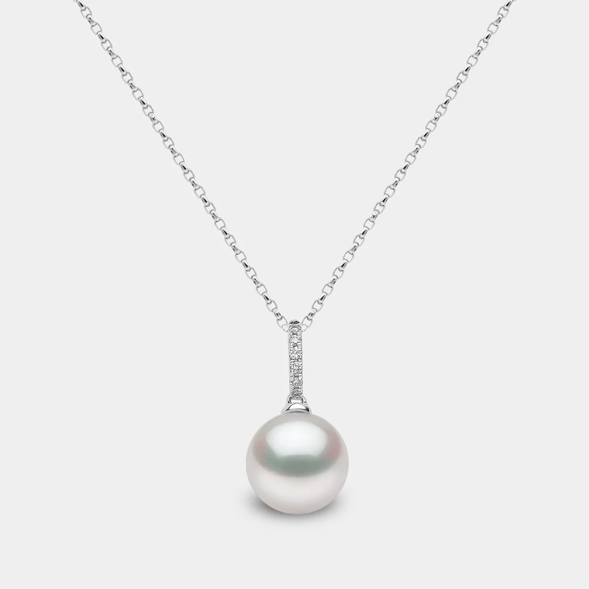 White gold cable chain necklace with pearl pendant featuring diamond accents