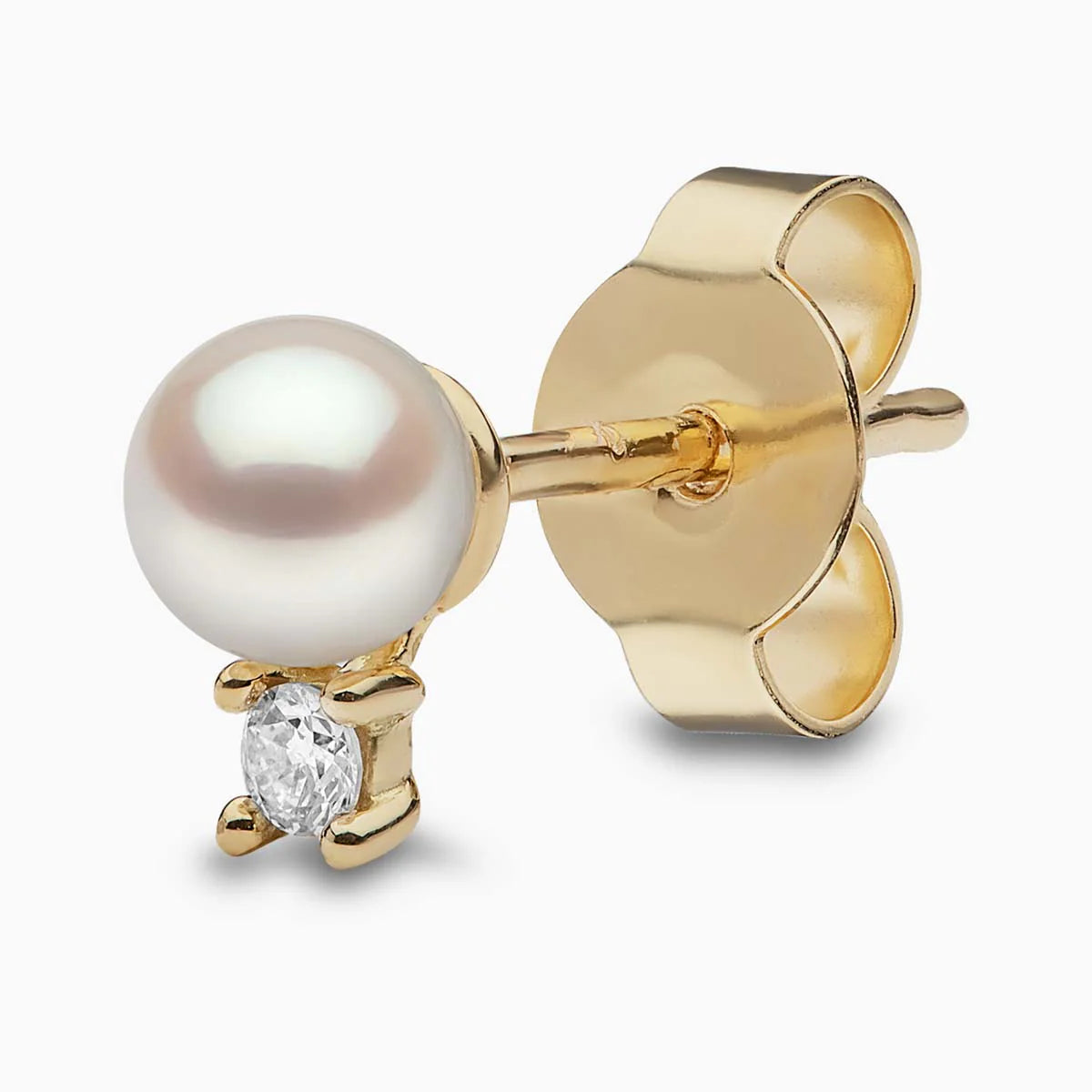 Single white pearl stud earring with diamond accent, front view