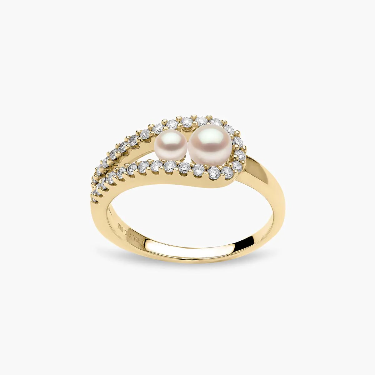 Yellow gold fashion ring with two white pearls and diamond accents on grey background, front view