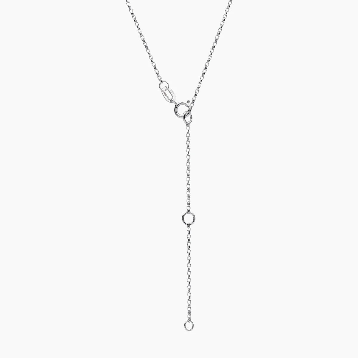Spring ring clasp on white gold cable chain necklace on grey background
