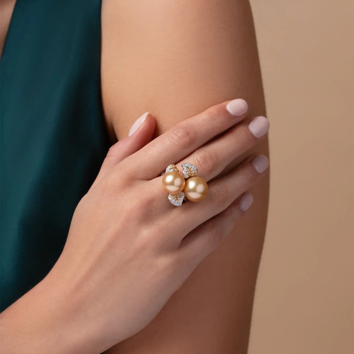 gold pearl ring with diamonds