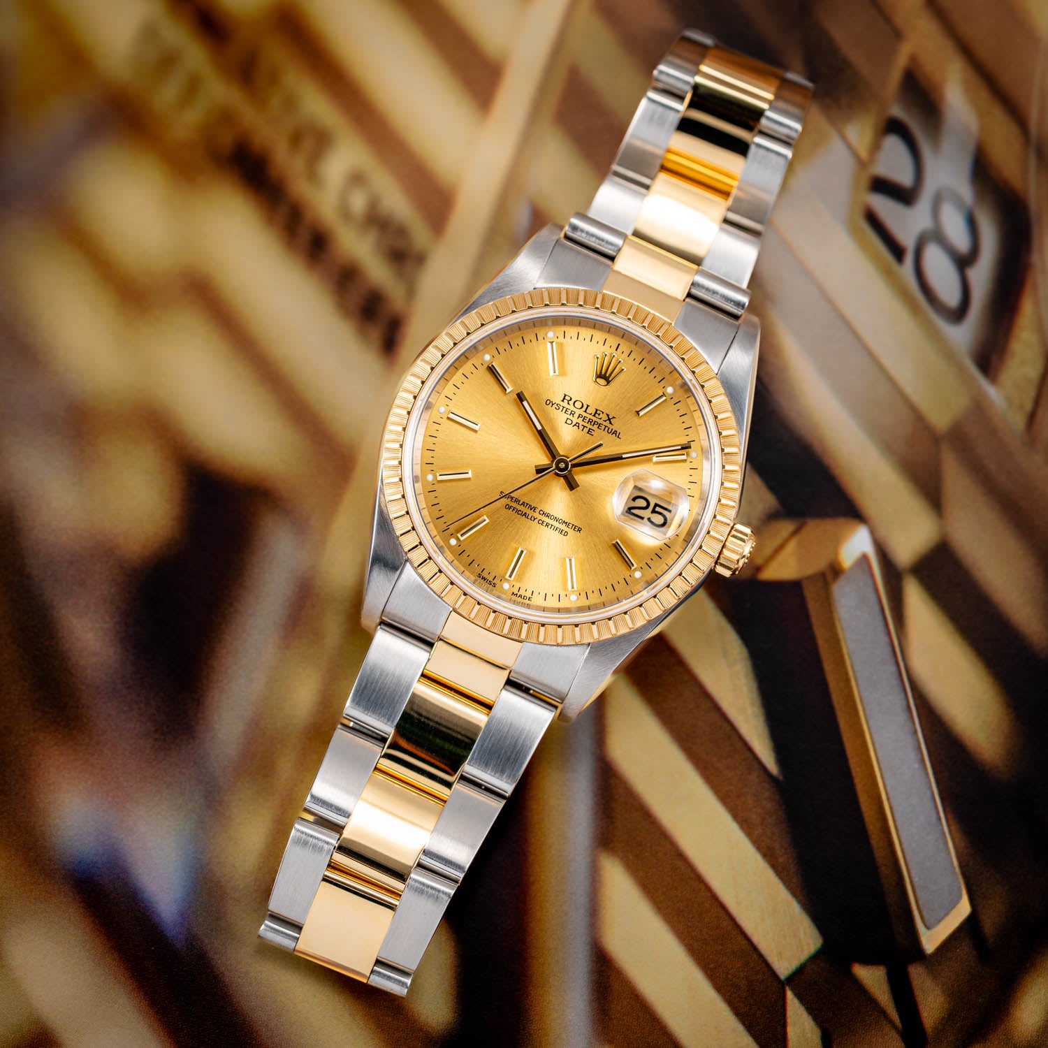 Rolex Oyster Perpetual Date Two-Tone Champagne Dial 34mm - 15223