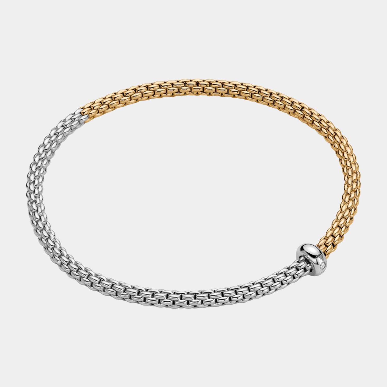 Yellow and white gold stretch bracelet with diamond charm accent