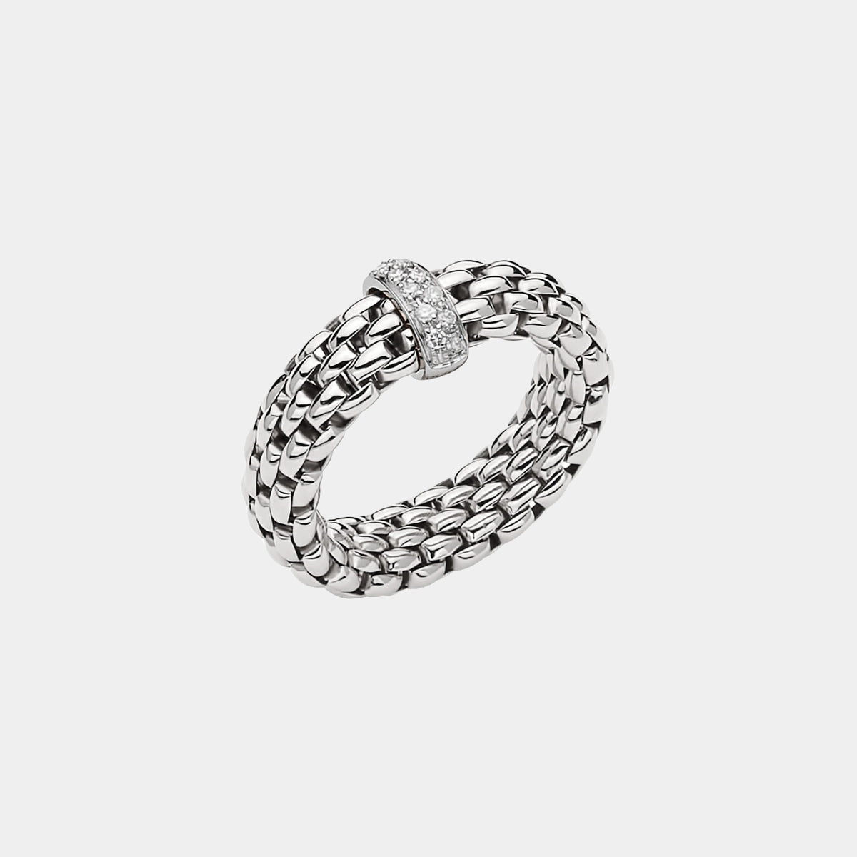 White gold diamond fashion ring on grey background