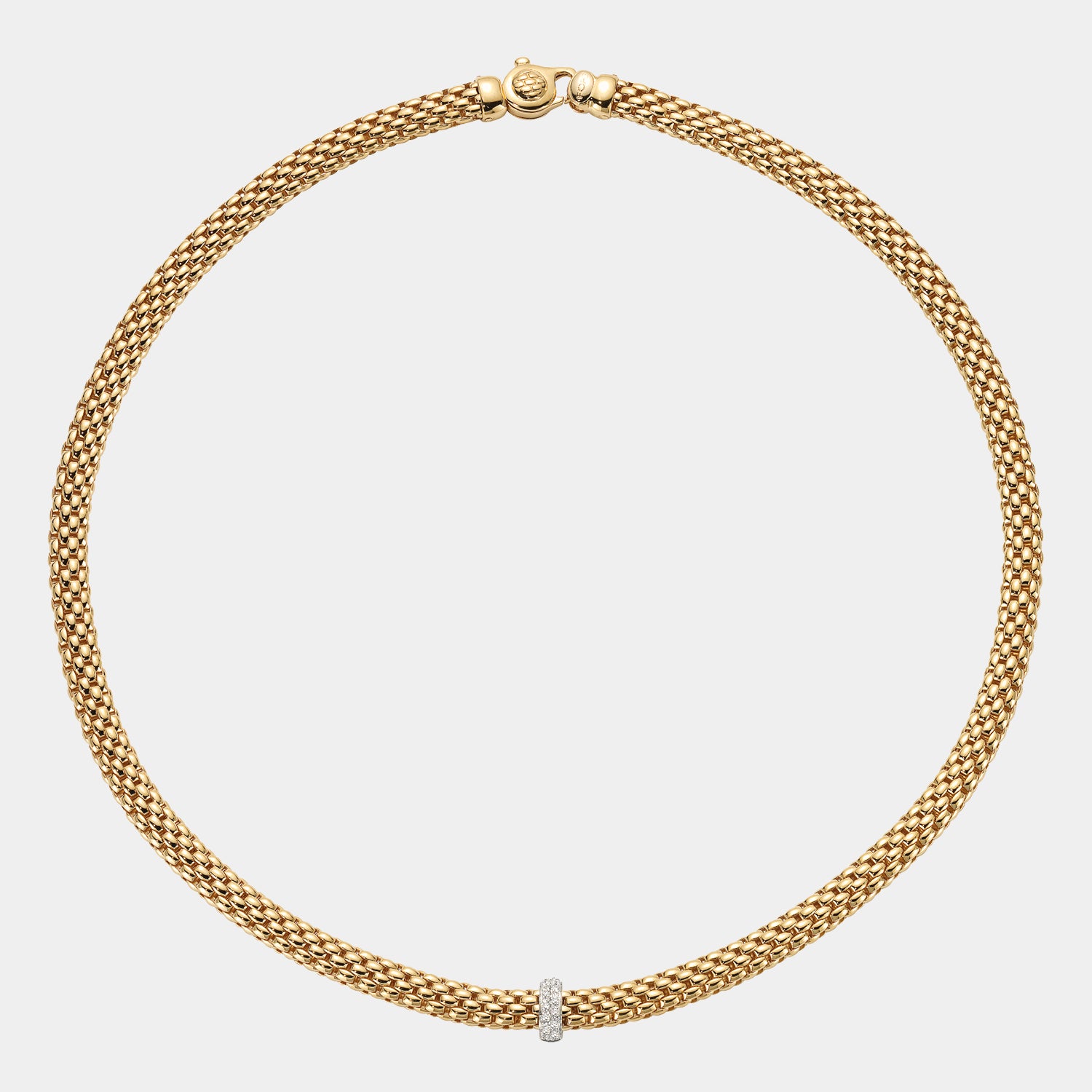 Yellow and white gold diamond necklace on grey background