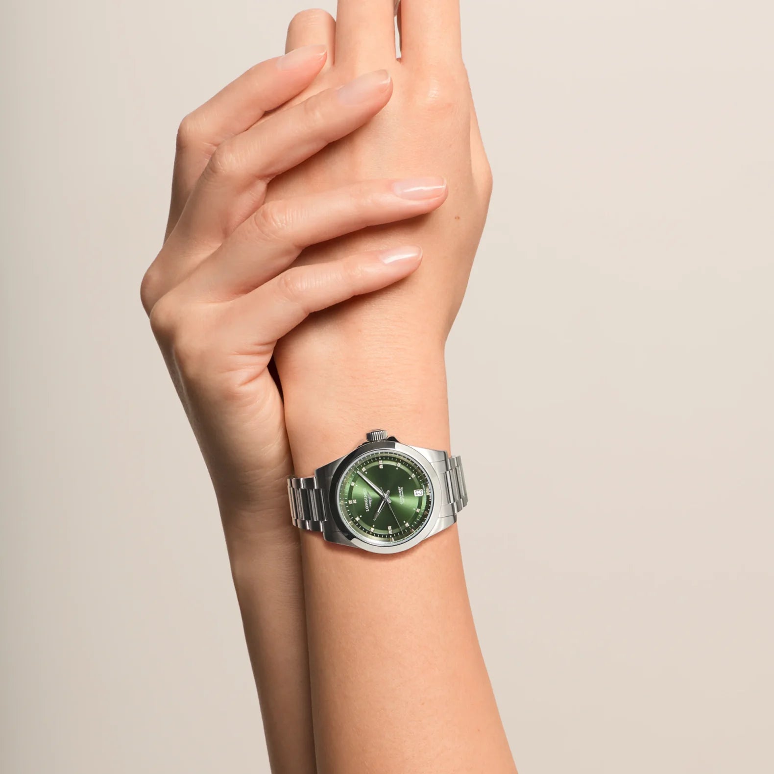 Conquest 34mm - Sunray Green Dial on Bracelet