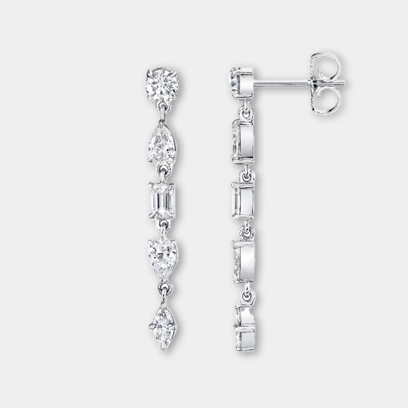 White gold diamond drop earrings on grey background, front and side angle view