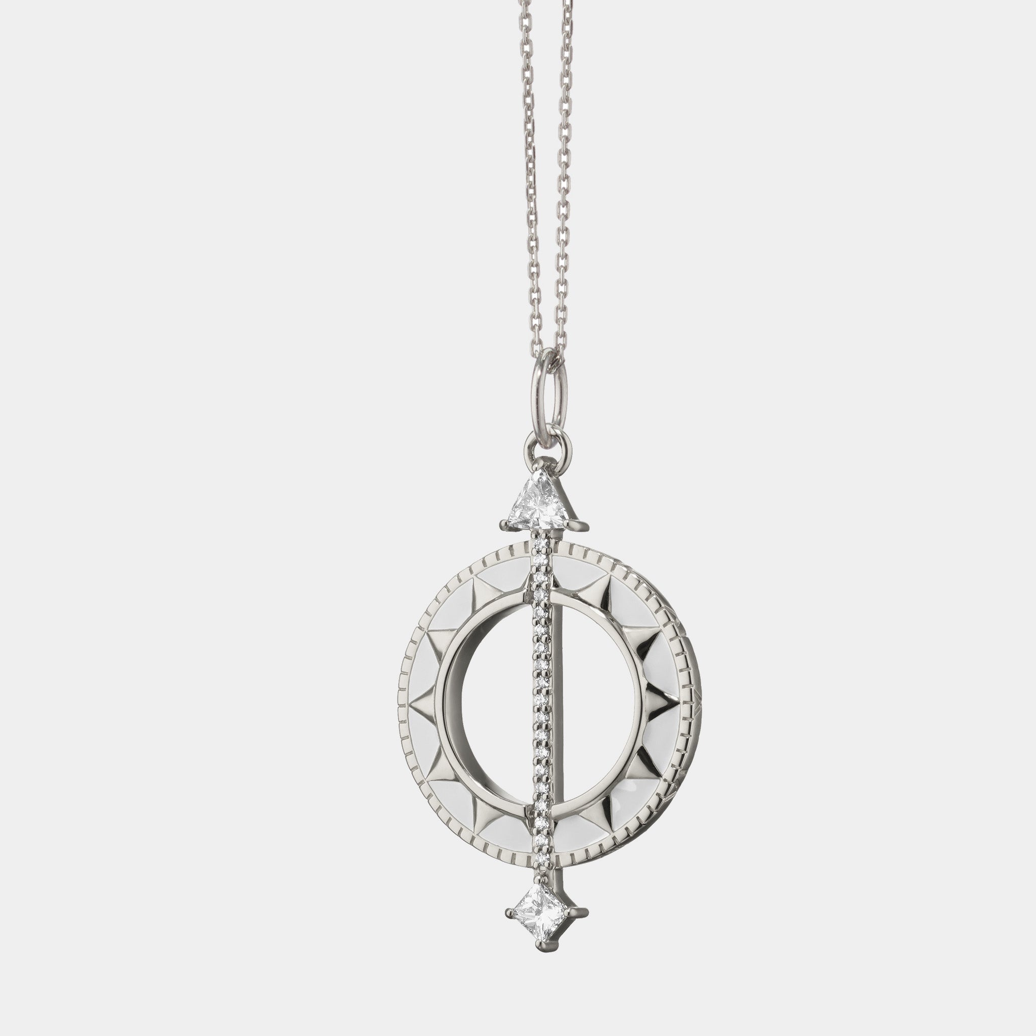 Sterling silver sundial rock crystal and white sapphire necklace on grey background