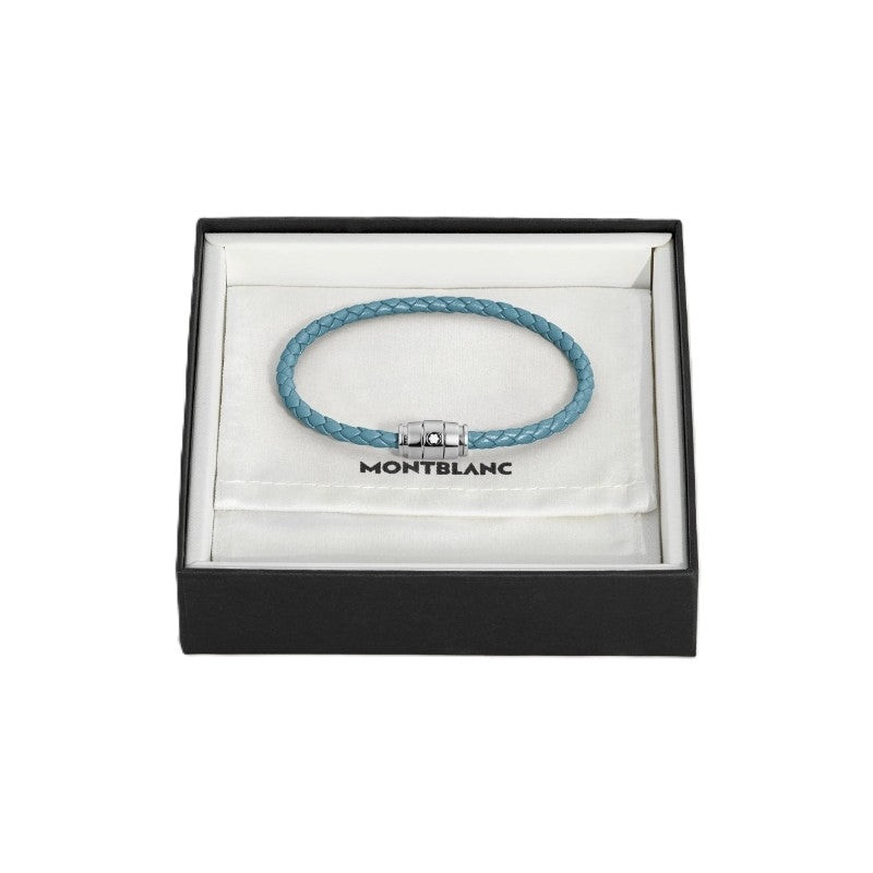 Blue braided bracelet with a silver clasp in a Montblanc box on a white background
