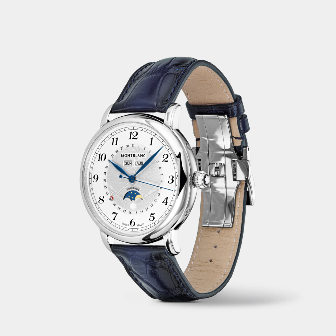 Luxury watch with blue leather strap and silver case on a white background