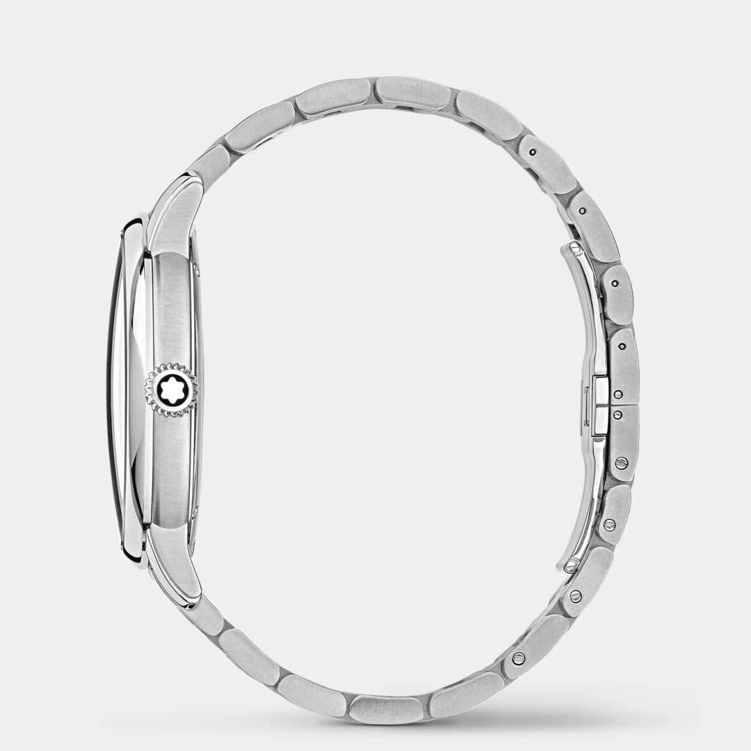 Silver watch with a detailed band on a light gray background