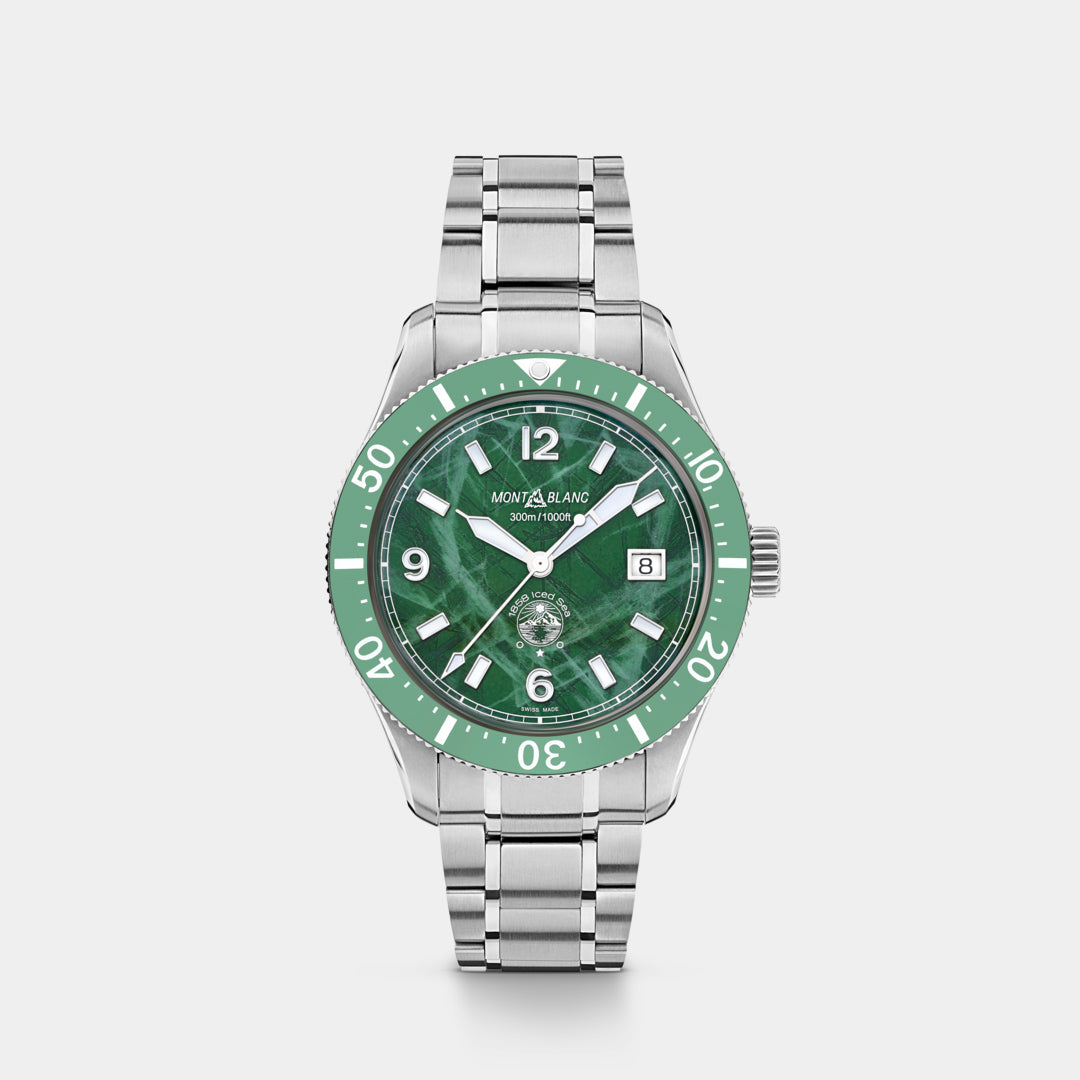 Silver watch with a green dial on a light gray background