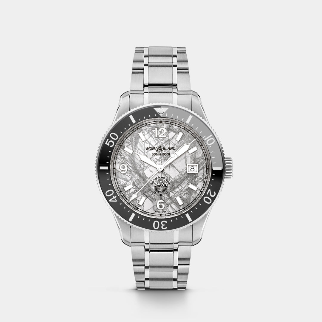 Silver watch with black bezel on a light gray background